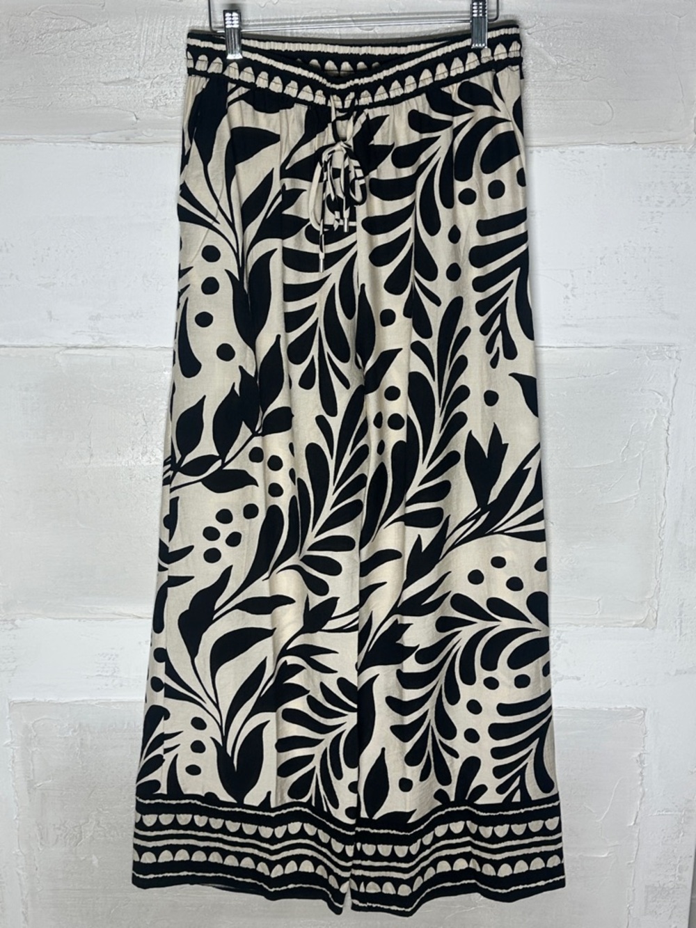 New w tags. Skies are Blue ivory black pants. Drawstring wide leg pockets medium